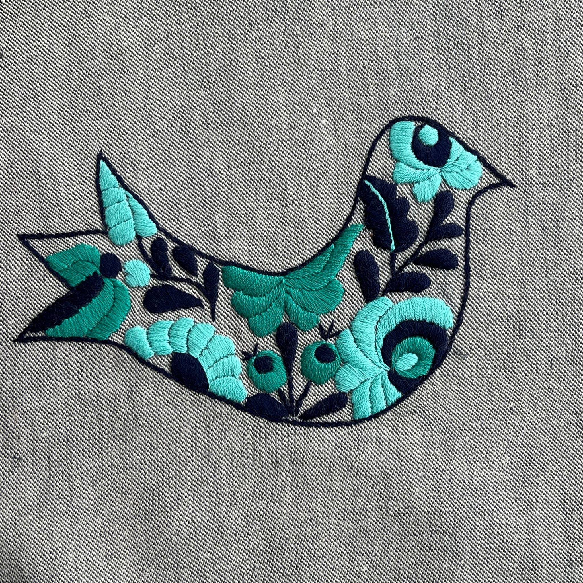 Mochila portabebés NIRMI Pure con parche de Impacto "Pájaro Matyó"